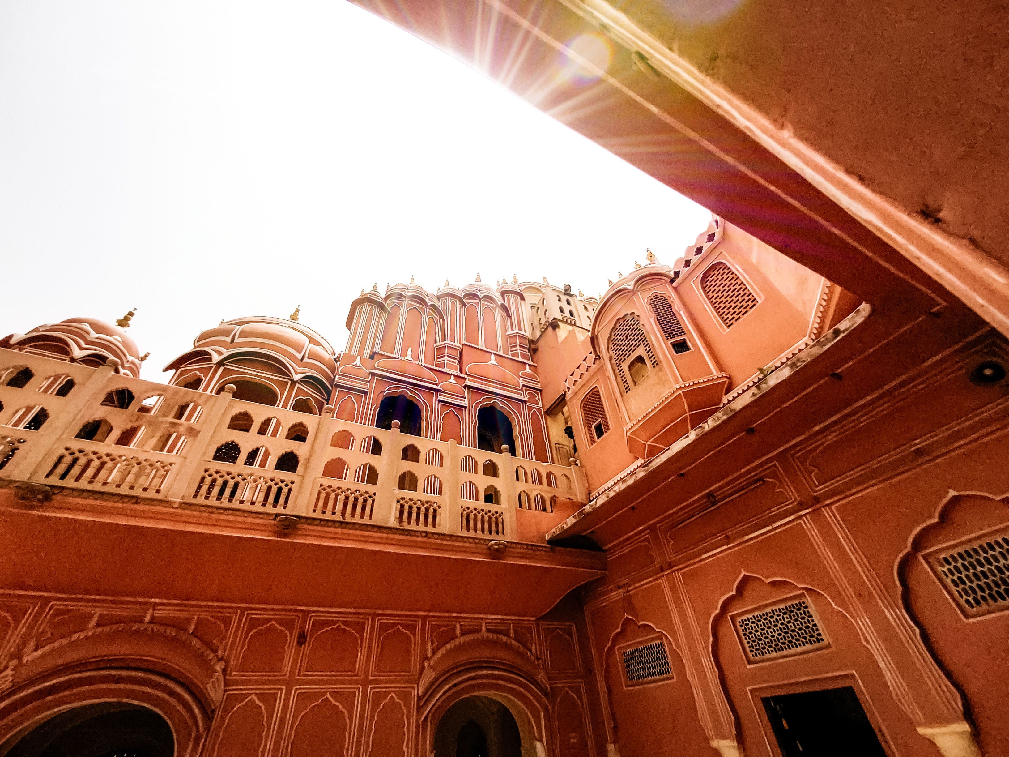 Low angle view of the Hawa Mahal palace facade in Jaipur, India