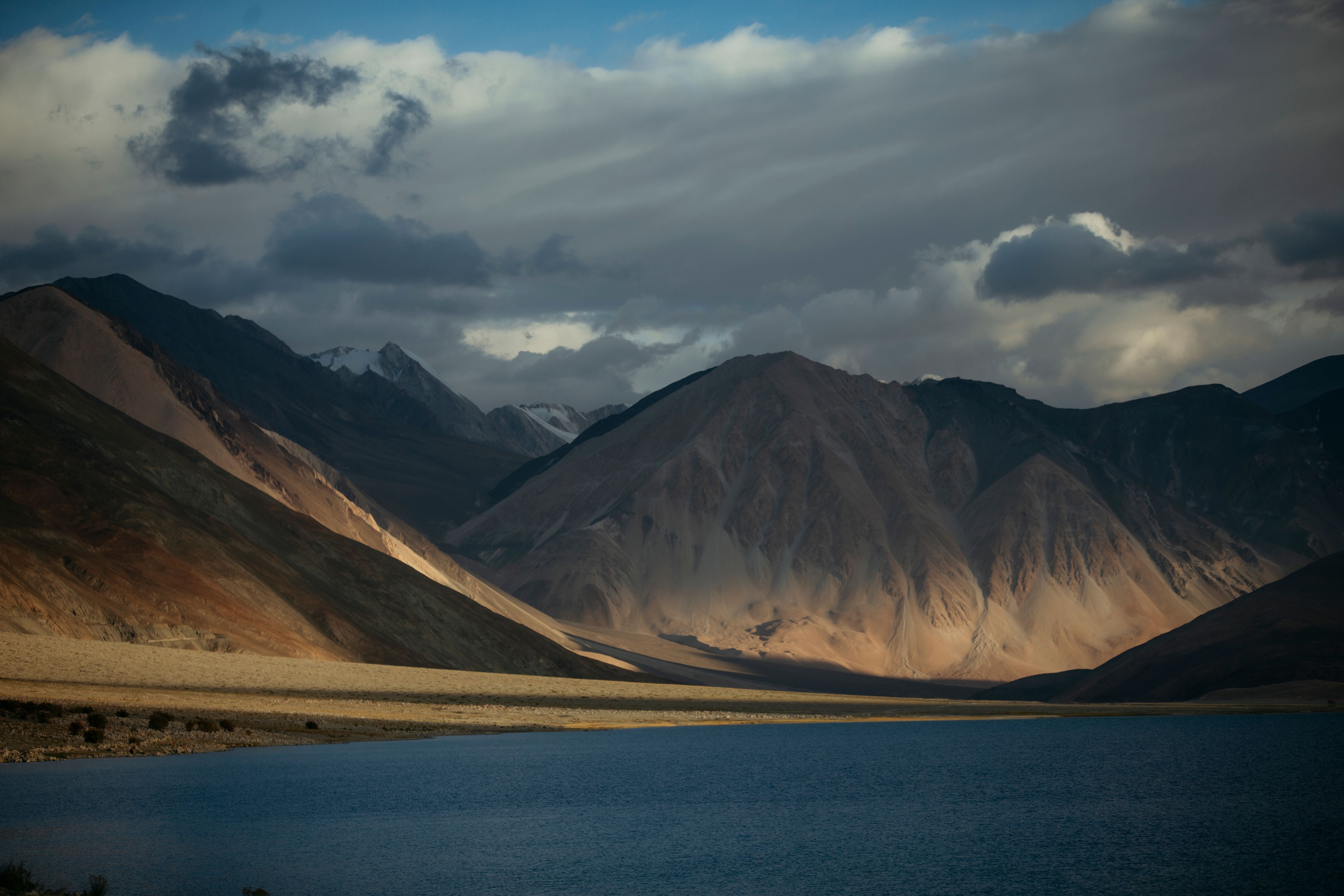 Breathtaking view of Pangong Lake surrounded by mountains in Ladakh