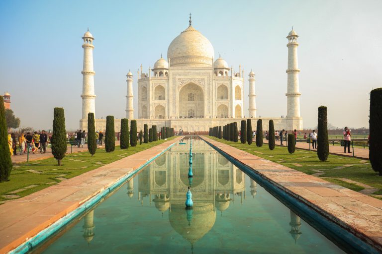The iconic Taj Mahal reflected in its garden pool in Agra, India