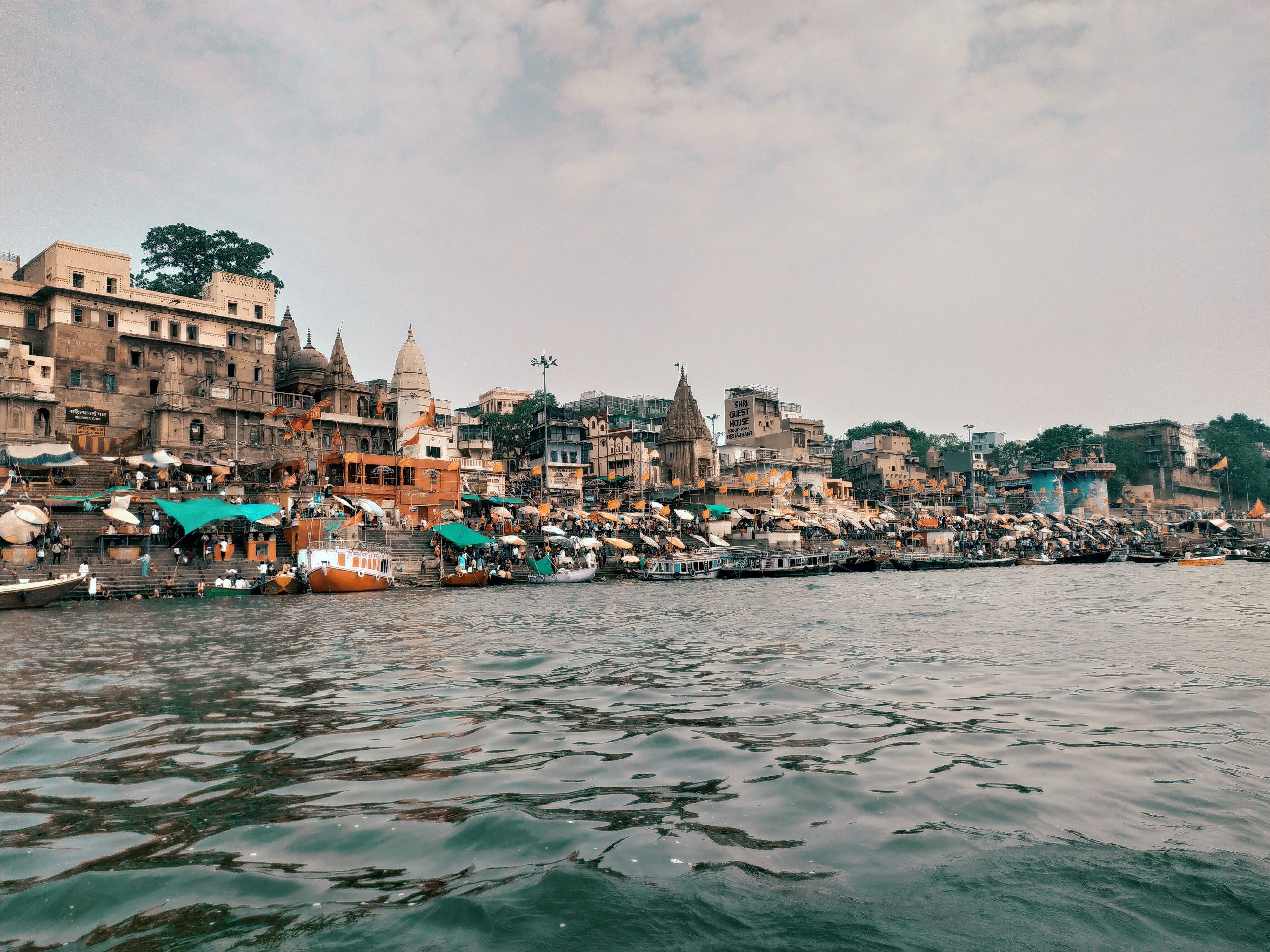 Colorful riverside ghats along the Ganges River in Varanasi